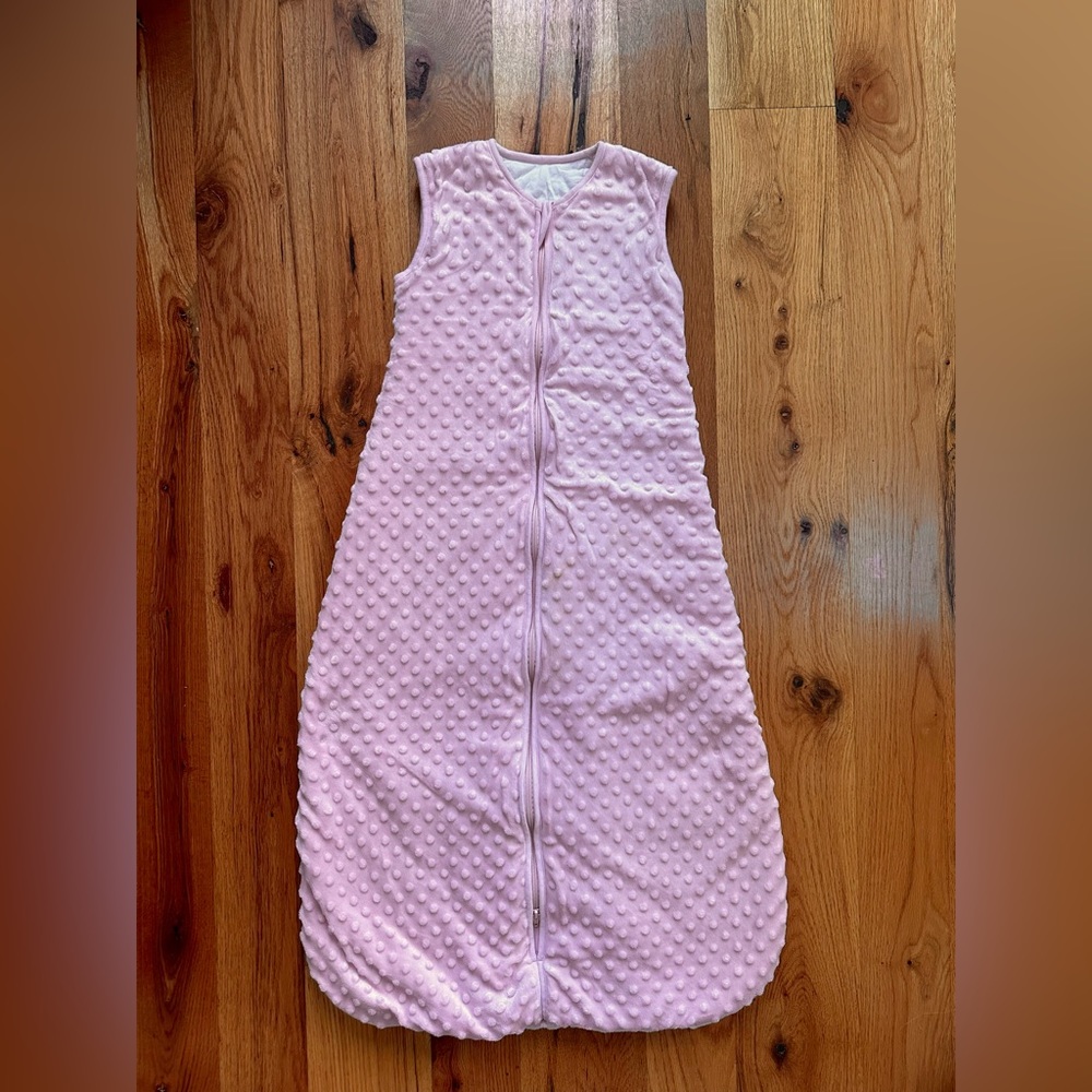 Two Baby in a bag sleep sacks and two Halo Early Walker sleepers